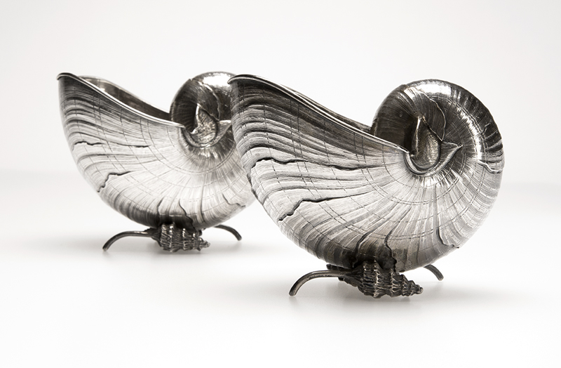 Crafted by Italian maker Buccellati, these handsome sterling silver nautilus shell-form spoon warmers brought $3,600 (est.: $1,200-$1,800). John Moran Auctioneers image