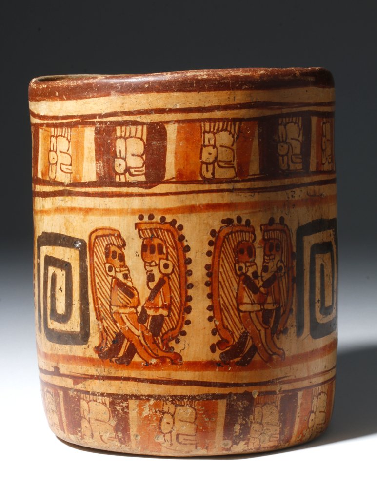 Mayan Ulua Valley (Honduras) polychrome cylinder, circa 550-900 CE, finely painted in hues of red, orange and chocolate brown, est. $3,500-$4,500. Artemis Gallery image