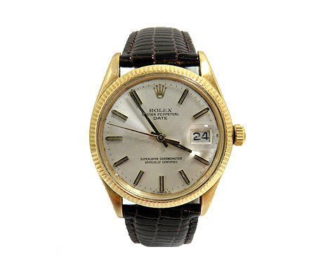 Rolex Oyster Perpetual with Date watch, 1980 with original strap, 14K solid gold, all original. Estimate: $3,000-$5,000. Jasper 52 image