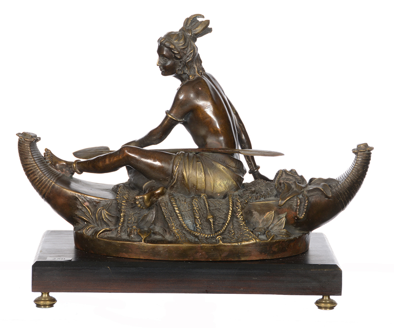 Nineteenth century French figural sculpture of an Indian maiden in a canoe, 11 1/2 inches tall. Woody Auction image