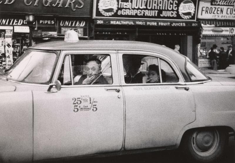 'Taxicab driver at the wheel with two passengers, N.Y.C. 1956' © The Estate of Diane Arbus, LLC. All Rights Reserved