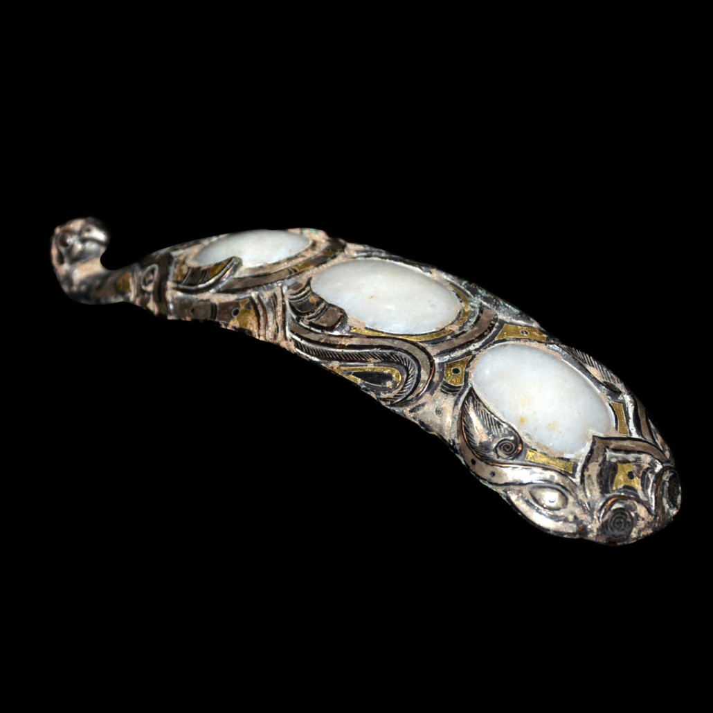 Gilt silver Inlaid with Jade bronze garment hook with gold and silver inlay between three jade cabochons. Estimate $2,000-$3,000 