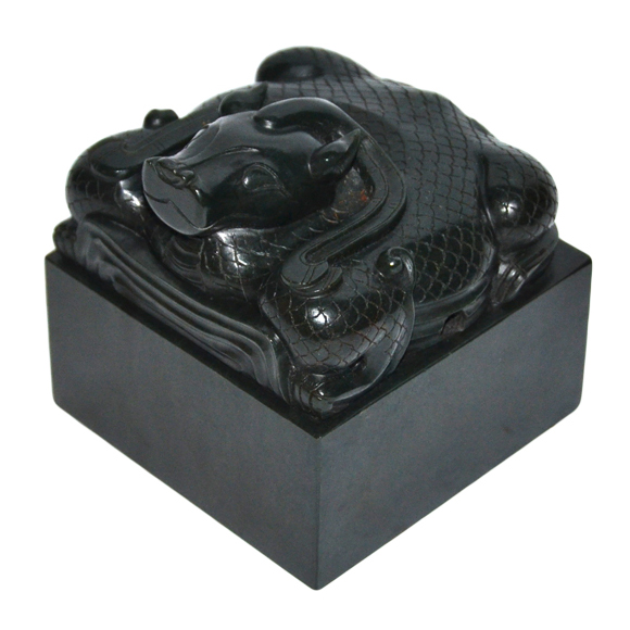 Imperial spinach-green seal carved with a recumbent ox-head mythical beast. Ming Dynasty. 4 inches square. Carries the Hongwu Imperial six scrip seal. Estimate $1 million to $2 million. 