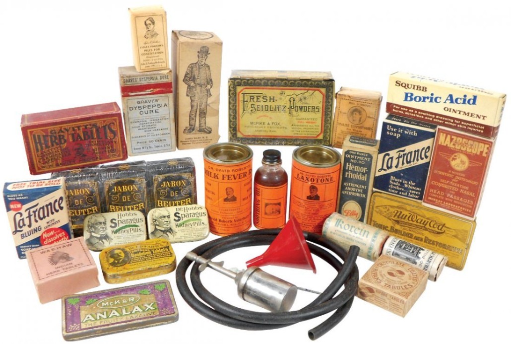 Drug Store items including  Dr. Edwards' Compounded Dandelion Tablets (lower left; yellow tin). Image courtesy of LiveAuctioneers.com archive and Rich Penn Auctions. 