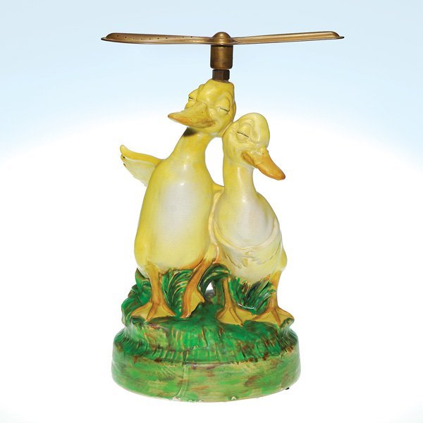 Weller Gardenware “Happy Ducks” lawn sprinkler depicting a pair of lazily smiling yellow ducks on a Coppertone mound. Sold for $5,500