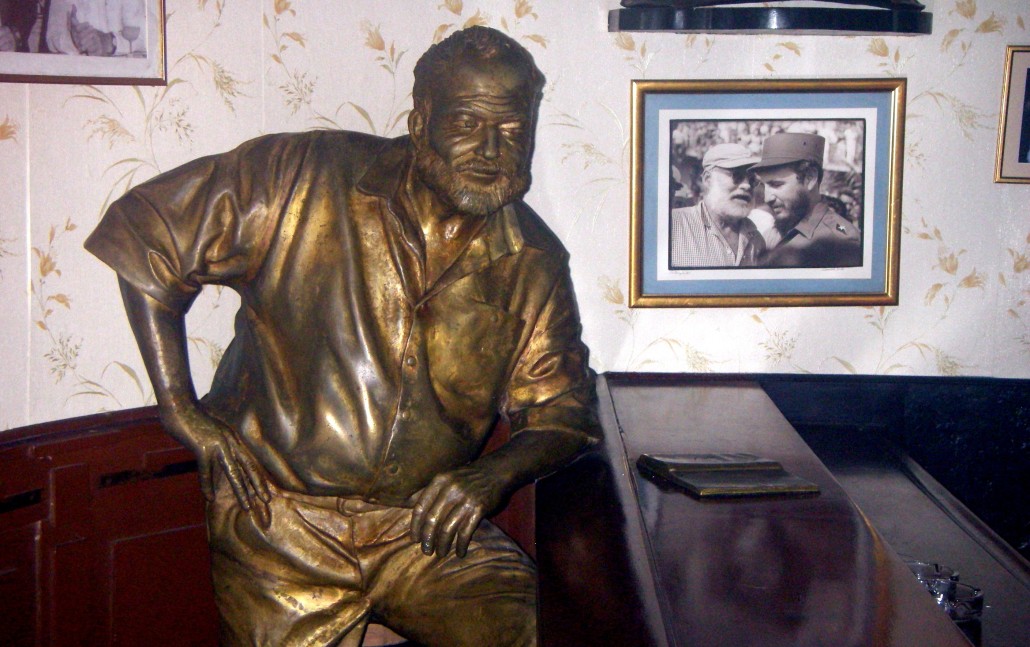 Image from the interior of the Floridita bar, in Havana, Cuba. Statue of Ernest Hemingway by Cuban artist José Villa Soberón. Photo: Frederic Schmalzbauer, licensed under the Creative Commons Attribution-Share Alike 3.0 Unported license