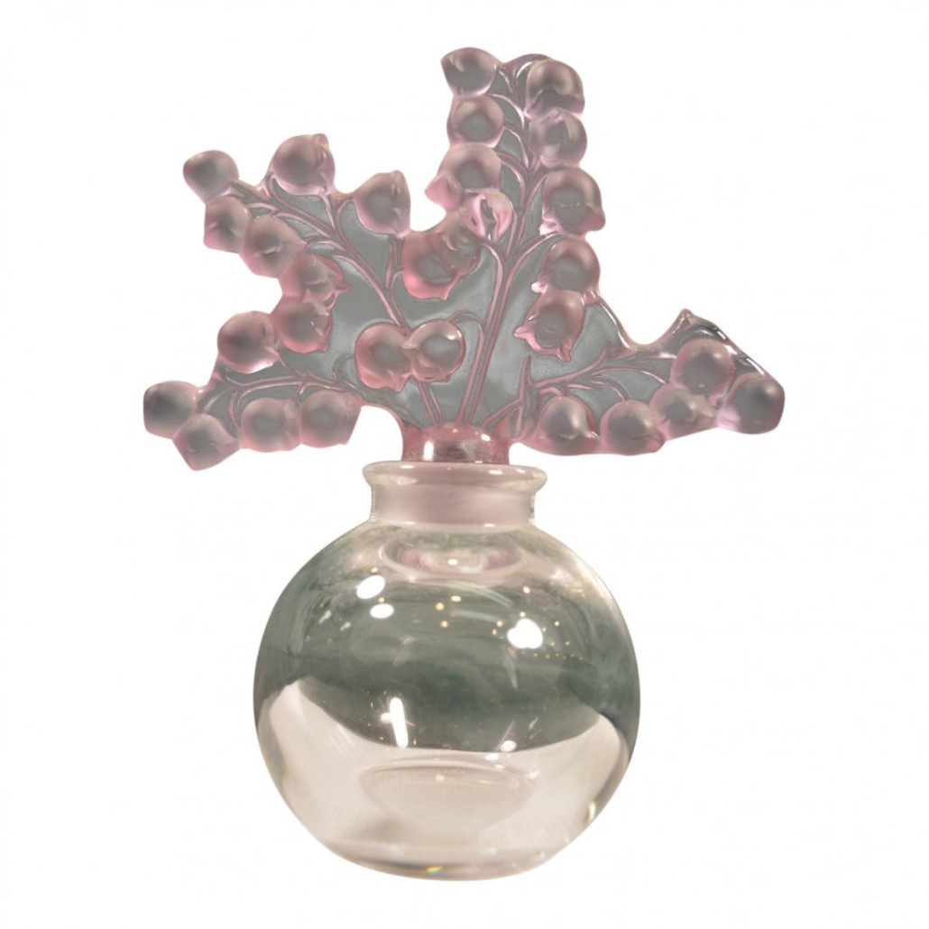 Made in 1991, this Lalique Clairefontaine perfume bottle features a sculptural lily-of-the-valley stopper of lavender-colored and amethyst frosted crystal. Estimate: $200-$250. Jasper 52 image