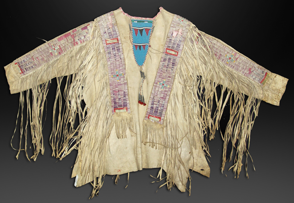 Historic, all-buckskin Northern Plains quilled war shirt, made in the late 1880s and boasting a beautiful wide quilled sleeve and body strips (est. $30,000-$60,000). Allard Auctions Inc. image