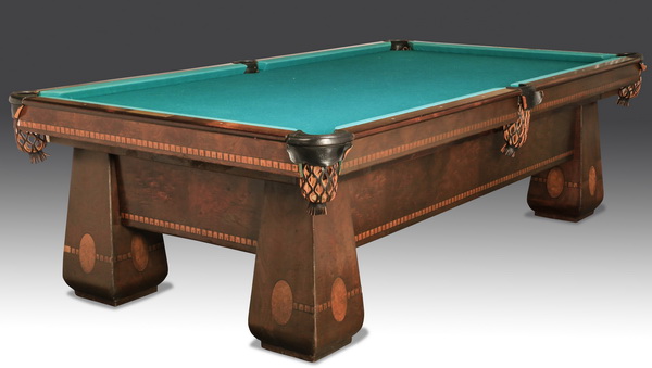 Pool table manufactured by Brunswick Balke-Collender Co. with burlwood with bird's eye maple marquetry inlay. Great Gatsby’s Auction Gallery image