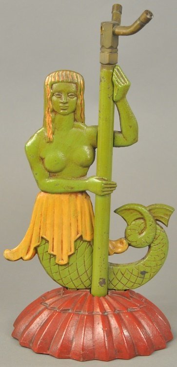 Cast iron double sided figural mermaid sprinkler in art deco style. Sold for $4,750