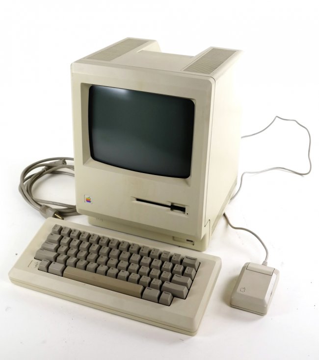 Original Macintosh with carrying case. Estimate: $250-$500. Roland Auctions NY