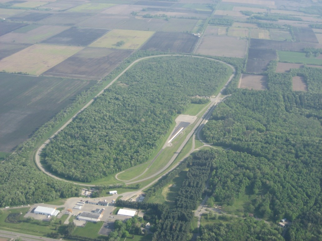 Aerial view of the former Studebaker Proving Ground. The grove of trees spelling the automaker's name can be seen at the lower right. Image courtesy of Wikimedia Commons