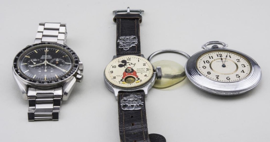Three watches including Mickey Mouse by Ingersoll watch parts and Omega Speedmaster Professional. Sold for $5,400. Capo Auction image