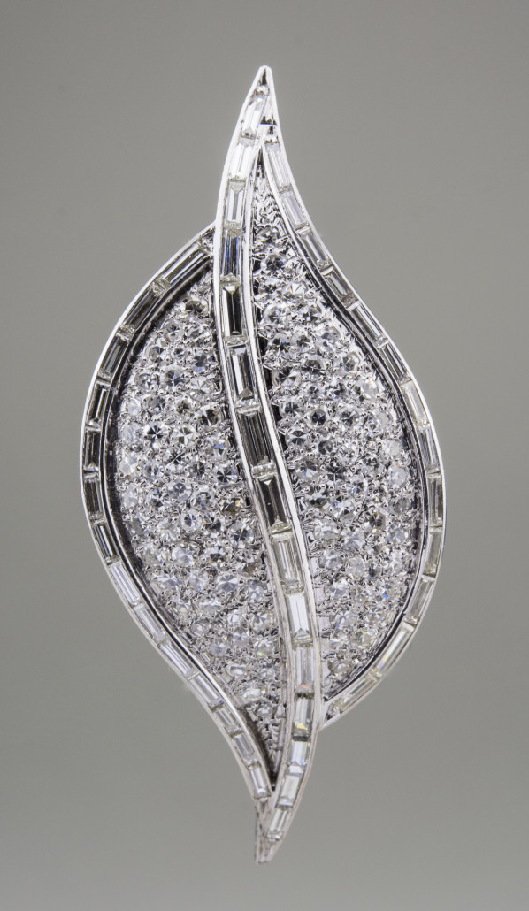 Van Cleef & Arpels 18K white gold leaf pin pave-set with rough and baguette diamonds, est. $4,000-$6,000