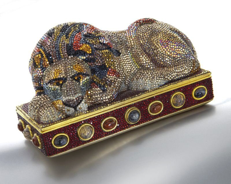 Dallas Auction Gallery offered this 6-inch ‘Sleeping Lion’ minaudiere covered with tawny crystals and multicolored cabochon hardstones in a 2013 vintage couture and contemporary luxury goods sale. It sold for $3,438, more than twice the high estimate.