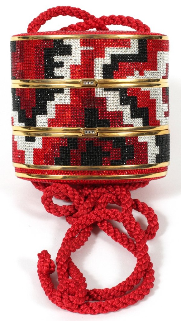 The form of Japanese inro, a container for small objects hung from a sash, inspired this tripartite beaded minaudiere with red silk cord and a gold leather lining. The colorful purse sold for $4,613 at DuMouchelles in Detroit in 2013.
