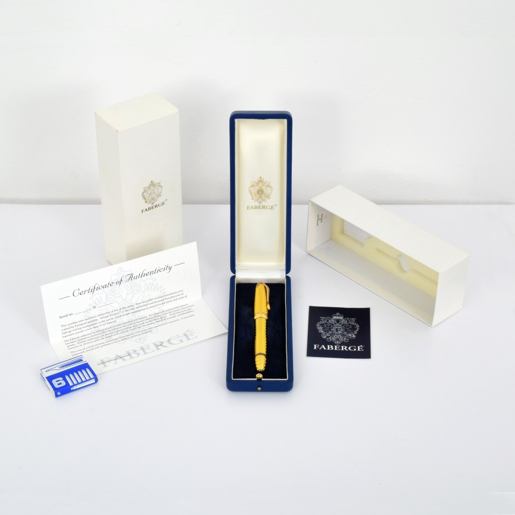 Faberge 18K gold fountain pen in original box with accessories, 688 from an edition of 1,000, est. $1,000-$1,500, est. $1,000-$1,500