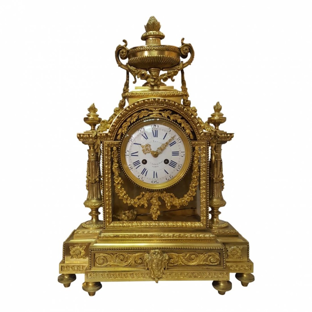This French mantel clock retains its original mercury gold pendulum. The early 19th century clock has a $5,500-$7,000 estimate. Jasper52 image