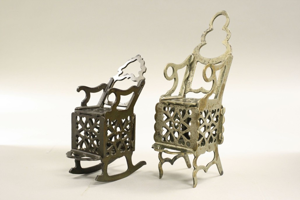 Standard Rocking Chair still bank, shown left, est. $2,000-$3,000; together with a previously unknown larger variation of this desirable bank shown at right, est. $4,000-$6,000