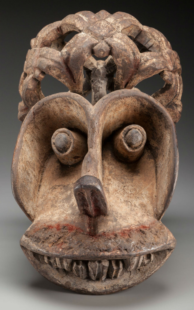 Dance mask. Bamileke, Cameroon. Wood, pigment, encrustation. 17 1/2 inches high. Estimate: $4,000-$5,000. Heritage Auctions image