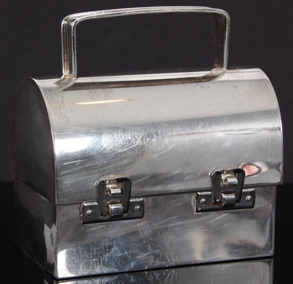 Cartier Sterling Silver Lunch Pail. Sold for $900