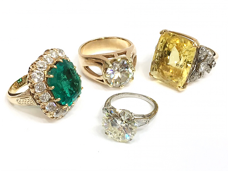 A selection of gold and platinum gemstone rings. Austin Auction Gallery image