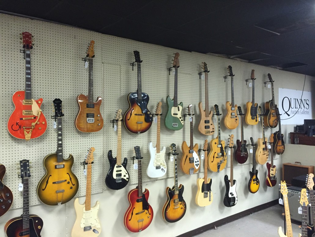 A wall display containing some of the great guitars that will be available in Quinn’s Sept. 7 evening auction of a single-owner collection