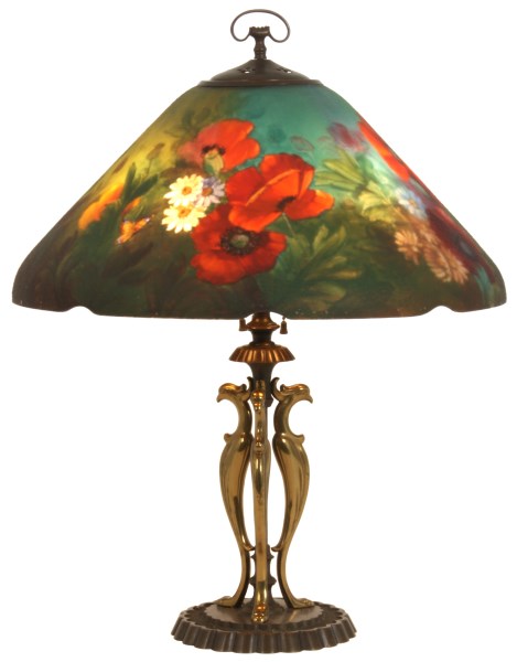 Handel Floral Poppy table lamp having a signed and numbered conical shade with a scalloped lower rim, reverse painted with vibrant flower clusters. Price realized: $21,780. Fontaine’s Auction Gallery image