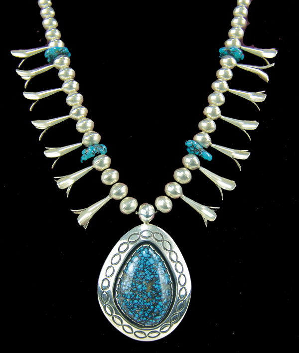 Exquisite teardrop shadowbox Lander Blue turquoise necklace by Navajo designer and craftsman Lee Yazzie. Price realized: $7,500. Allard Auctions Inc. image