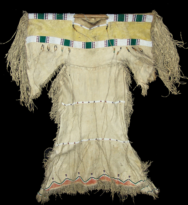 Traditional white buckskin Sioux women's dress, made around 1900. Price realized: $11,000. Allard Auctions Inc. image