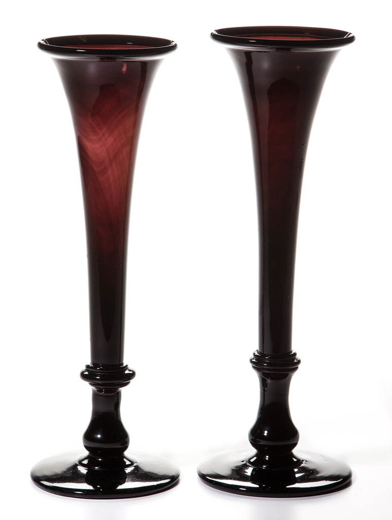 Pair of free-blown 13-inch-high trumpet vases in an unusual deep swirling smoky amethyst color, circa 1850. Price realized: $2,340. Jeffrey S. Evans & Associates image