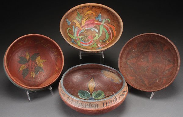 Group of 19th century Norwegian turned and rosemaled wood ale bowls in hallingdal and telemark styles. Jackson’s Auction image