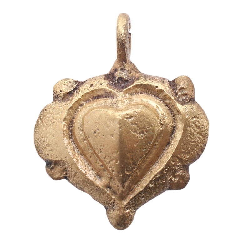 The heart symbol embodied the Viking spirit. Viking heart pendant, gold overlay, A.D. 850-1050. Estimate: $250-$300. Jasper52 image