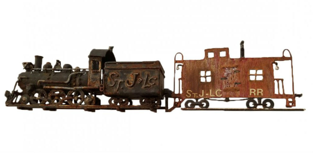 Handmade locomotive and caboose weather vane, circa 1920, 14 inches high by 24 inches long. Estimate: $1,000-$1,500. Jasper52 image 