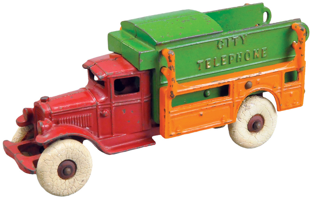 Kenton City Telephone truck, cast iron with embossed rubber tires, wood hubs, seated driver, est. $4,000-$6,000