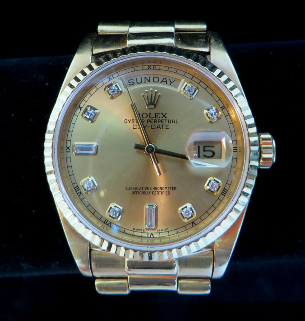 Rolex President Oyster perpetual day/time certified men’s wristwatch housed in an 18K gold case. Estimate: $6,000-$10,000. Converse Auctions image