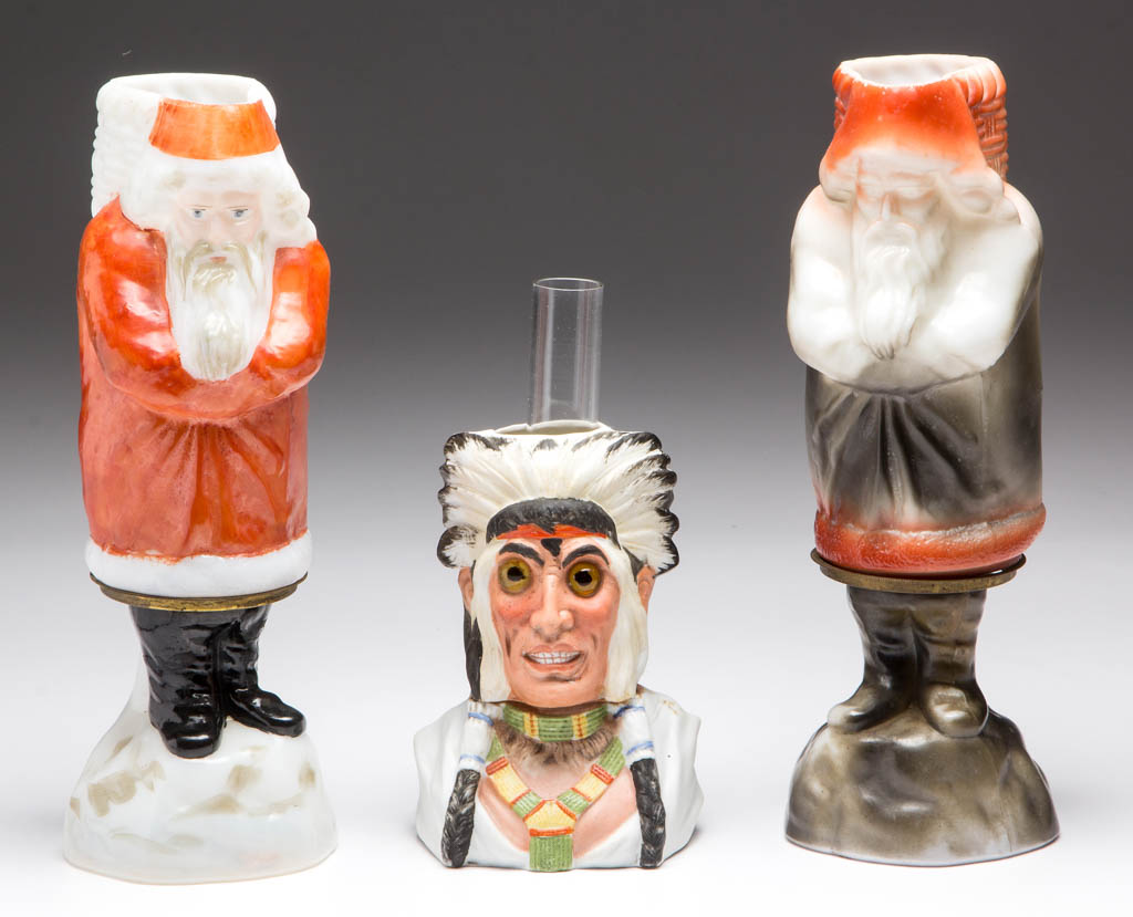Sample of rare figural miniature lamps including one of three recorded small-size bisque Indian Chiefs. Jeffrey S. Evans & Associates image 