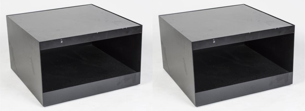 Two contemporary black tables, black glass tops on a painted metal bases. Price realized: $4,612.50. Capo Auction image