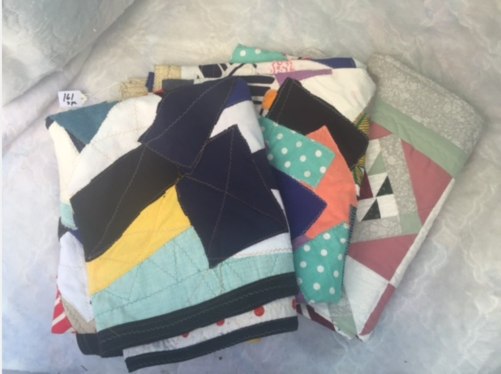Three baby quilts, including two vintage patchwork types, est. $50-$60