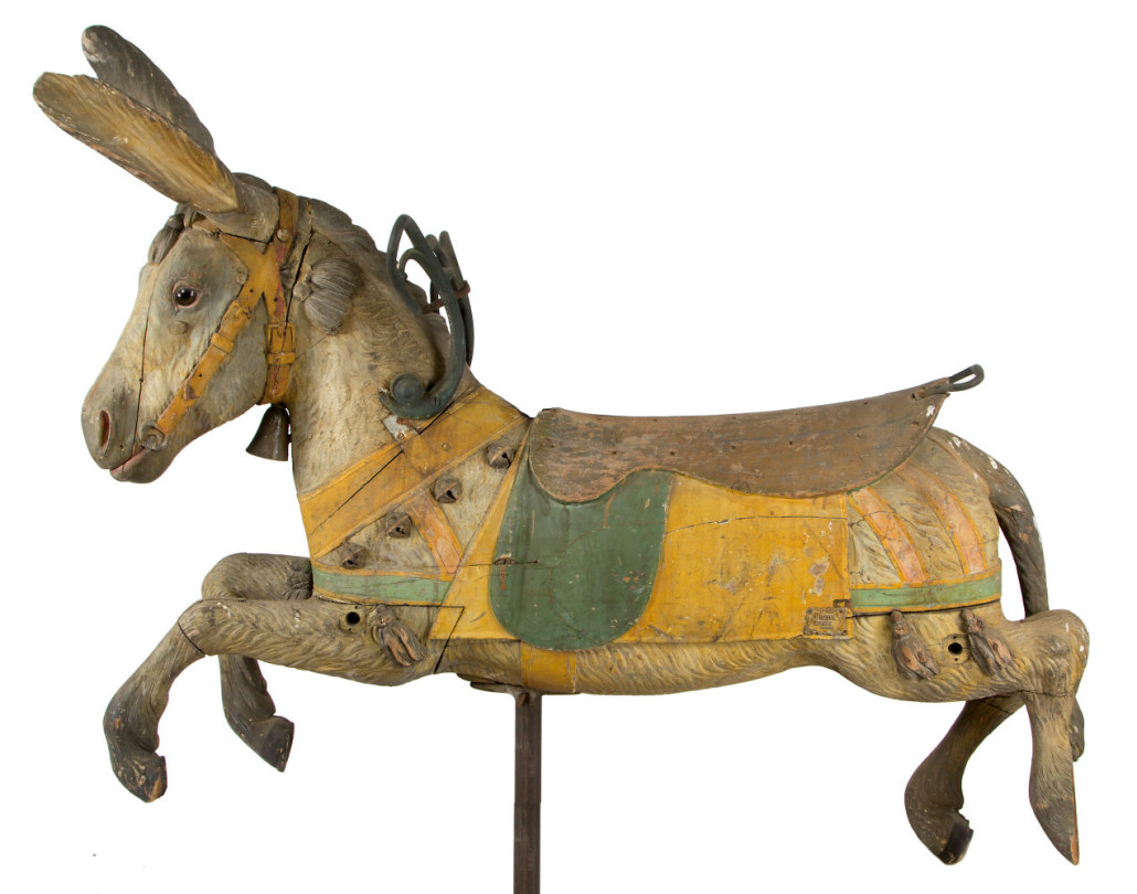 Folk art carved and painted hollow-body carousel donkey in outstanding dry original surface, from the workshop of Gustav Bayol (Angers, France, 1859-1931). Estimate $4,000-$6,000. Jeffrey S. Evans & Associates image
