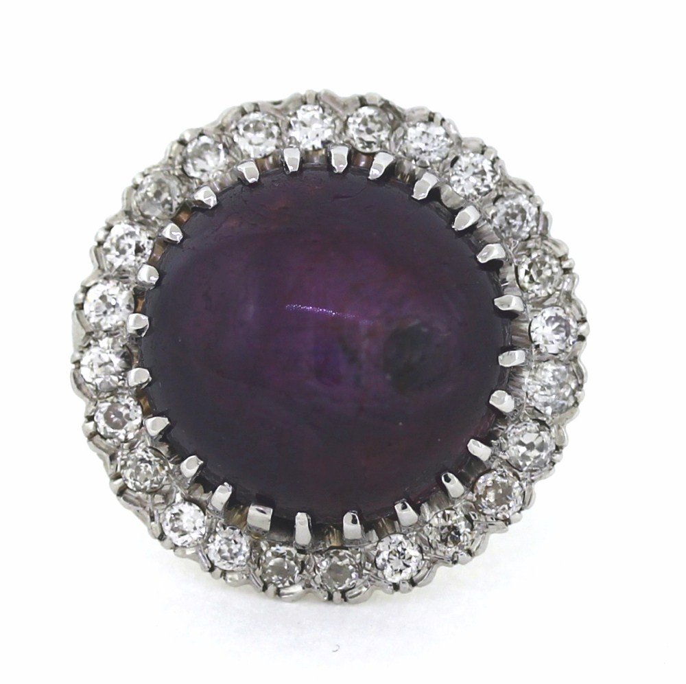 Estate purple star sapphire and diamond ring in an 18K white gold setting. Estimate: $5,000-$6,000. Jasper52 image