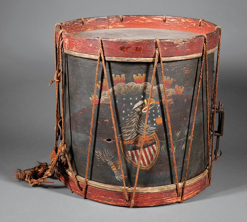 Jordan B. Noble infantry snare drum, early 19th century, label inscribed in ink ‘JB Noble’ and engraved ‘Klemm & Brother’s / Piano Forte & Music Warehouse,’ shell painted with Federal eagle, brass tack decoration, calfskin heads, rope and leather tensioners, 16 1/2 inches high x 16 3/4 inches in diameter. Estimate: $200,000-$250,000. Neal Auction Co. image