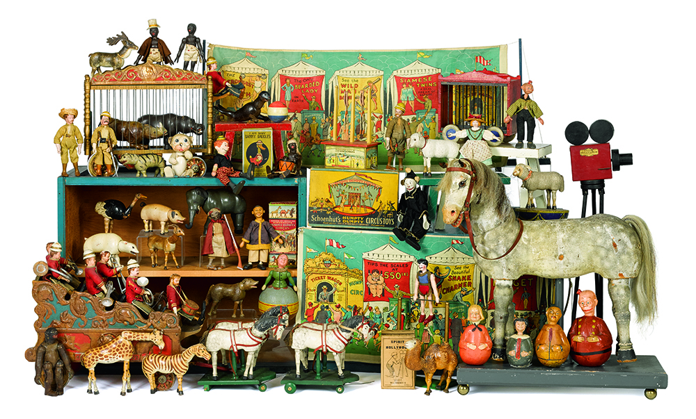 A fine representation of wood toys made by legendary Philadelphia toymaker Schoenhut includes animals, human figures, circus wagons, roly polys and more.