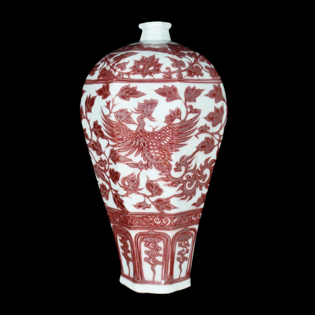 Yuan Dynasty, hard-edged, octagonal meiping on which two phoenixes cavort among leafy sprays and lotus lappets. Gianguan Auctions image 