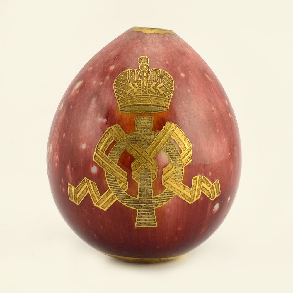 Russian porcelain Imperial presentation Easter egg, oxblood flambé, gold monogram of Dowager Empress Maria Feodorovna beneath the Imperial crown, 3 1/2 inches (8.9 cm). Estimate: $3,000-$5,000. Jasper52 image