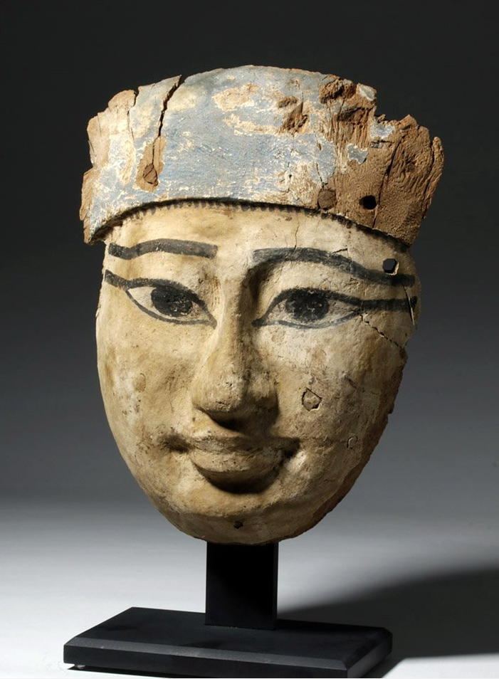 Exceptional Egyptian mummy mask, circa 750-500 BCE, carved and painted wood, est. $5,000-$7,000