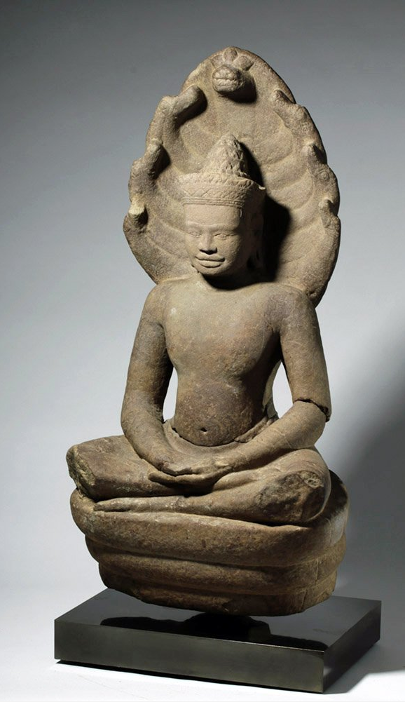 Incredible Khmer stone seated Buddha with giant naga, serpent king Muchilinda, late 12th to early 13th century CE, est. $30,000-$50,000