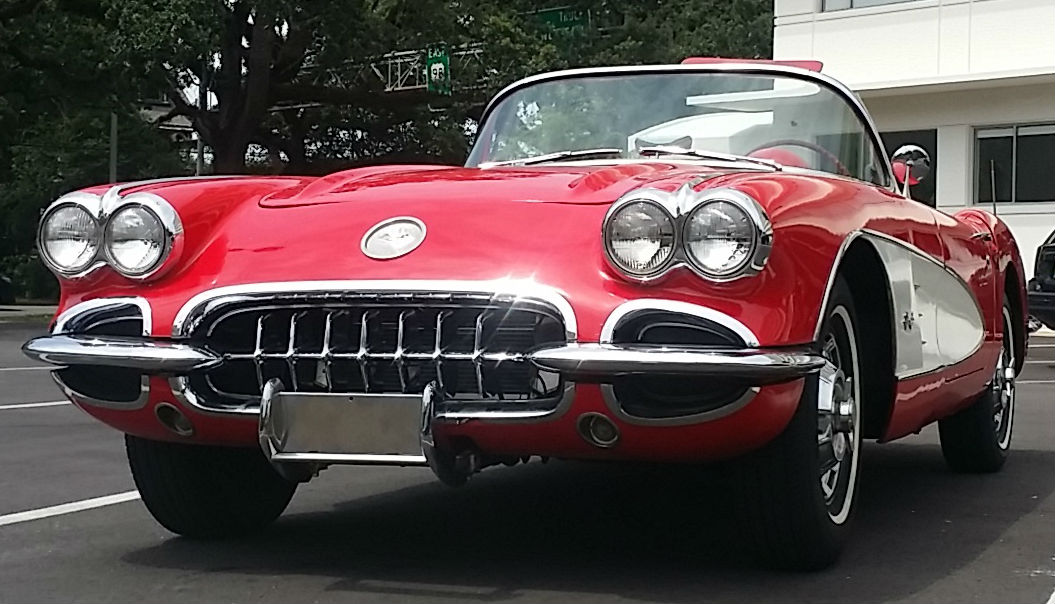 1959 Corvette convertible, red with white accents, with the original 283 engine and a four-speed transmission, in mint condition. Stevens Auction Co. image