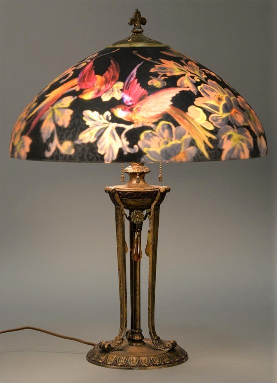 Handel Birds of Paradise table lamp, reverse painted with exotic birds among blossoming colored flowers (est. $5,000-$10,000). Nadeau’s Auction Gallery.