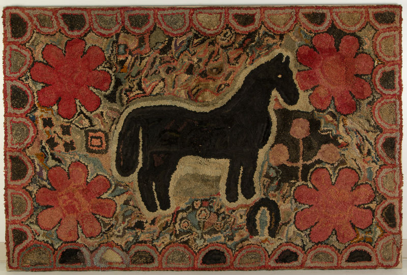 Late 19th-century American hooked rug of impressive size, lot 355, $8,190. Jeffrey S. Evans & Associates image